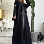 عبايه بأكمام جلد لون اسود