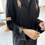 ⁦عبايه بأكمام جلد لون اسود⁩ - الصورة ⁦9⁩