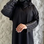 عبايه بشك سندس على اكمام مزينه بلون النحاسي