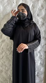 عبايه بشك سندس على اكمام مزينه بلون النحاسي