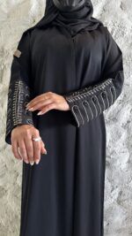 ⁦عبايه بشك سندس على اكمام مزينه بلون النحاسي⁩ - الصورة ⁦7⁩