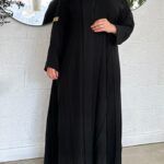 عبايه كلوش كلاسيك مزينة بدقات زري