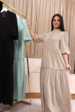 ⁦فستان القطن الفاخر بيج مكسره من وسط ومن اسفل⁩ - الصورة ⁦4⁩