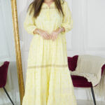 جلابيه اصفر بقماش مشجر من نفسه بكم مطاط