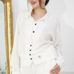 طقم كاجوال أبيض تتكون من قطعتين بأكمام طويلة وبنطلون طويل