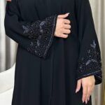 عباية شك اسود لامع في الأكمام