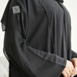 عباية نواعم كلوش شك اسود ظفيره