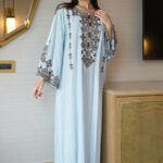 جلابية سماوي مطرزة بشك من حلق بلون رمادي