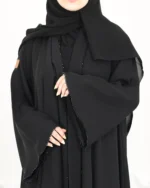 ⁦عباية كلوش بشك اسود محددة⁩ - الصورة ⁦8⁩