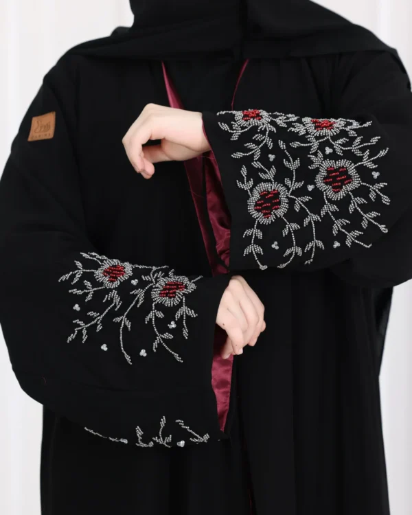 ⁦عباية أجوان بشك عنابي على اكمام⁩ - الصورة ⁦2⁩