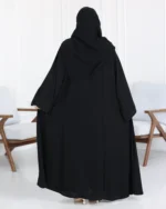 ⁦عباية ساده مغلقه بزراير مزينه نص كلوش محدد من الأكمام واجناب⁩ - الصورة ⁦3⁩