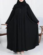 ⁦عباية ساده مغلقه بزراير مزينه نص كلوش محدد من الأكمام واجناب⁩ - الصورة ⁦2⁩